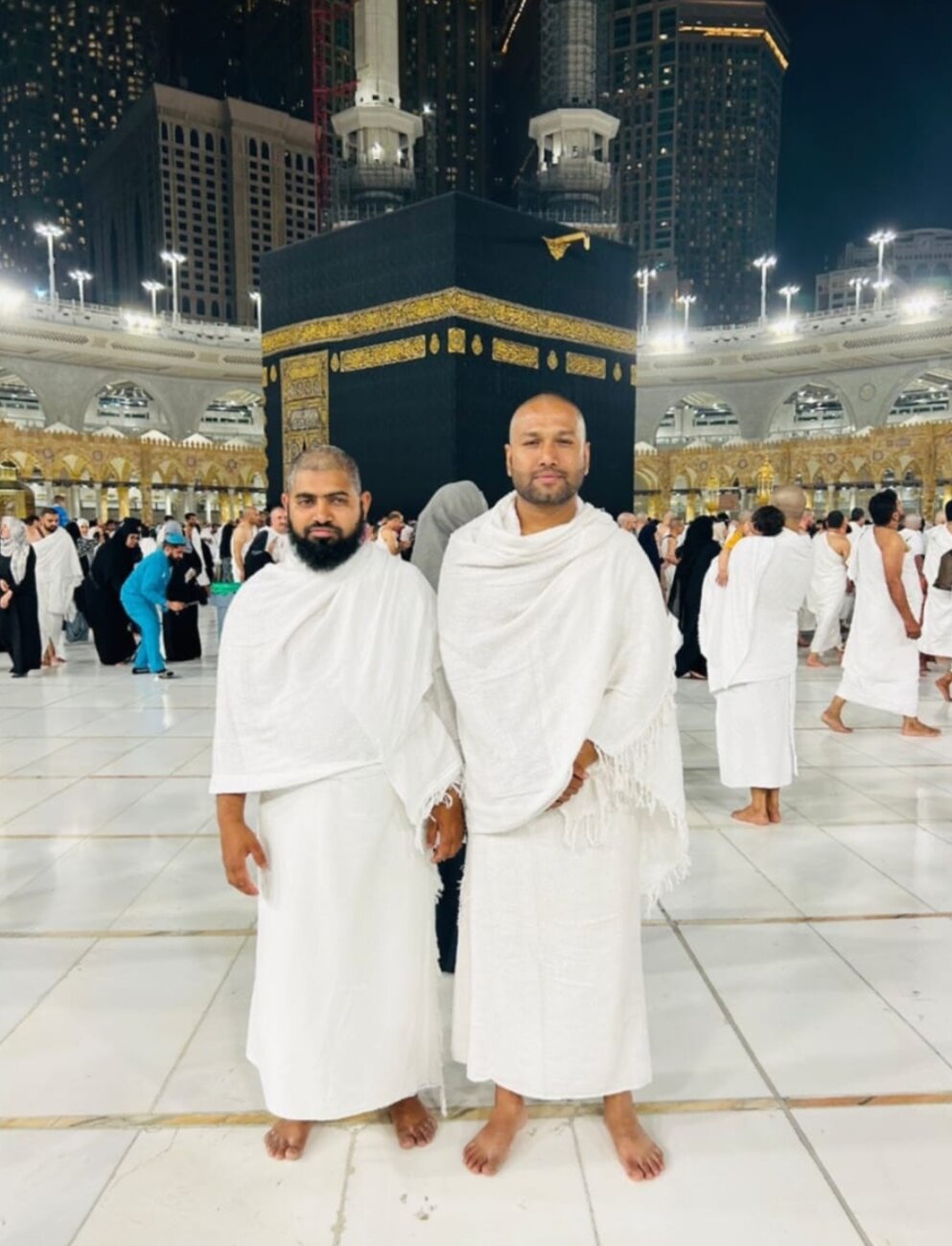 Nekib Hussain with Alhaj Monir Uddin in front of the Holy Kaaba